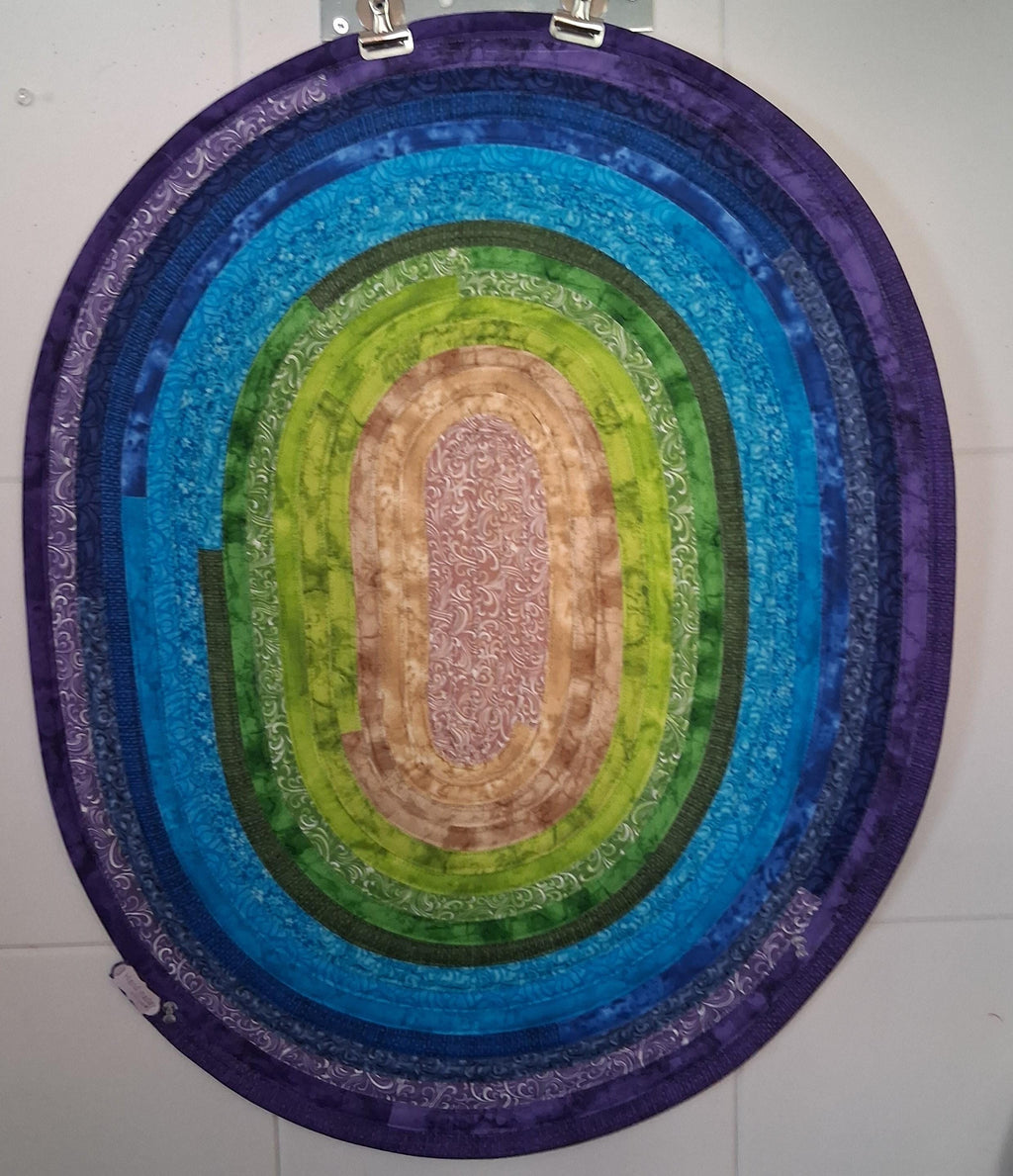 Multi-colored Handmade Oval Jelly Roll Rug