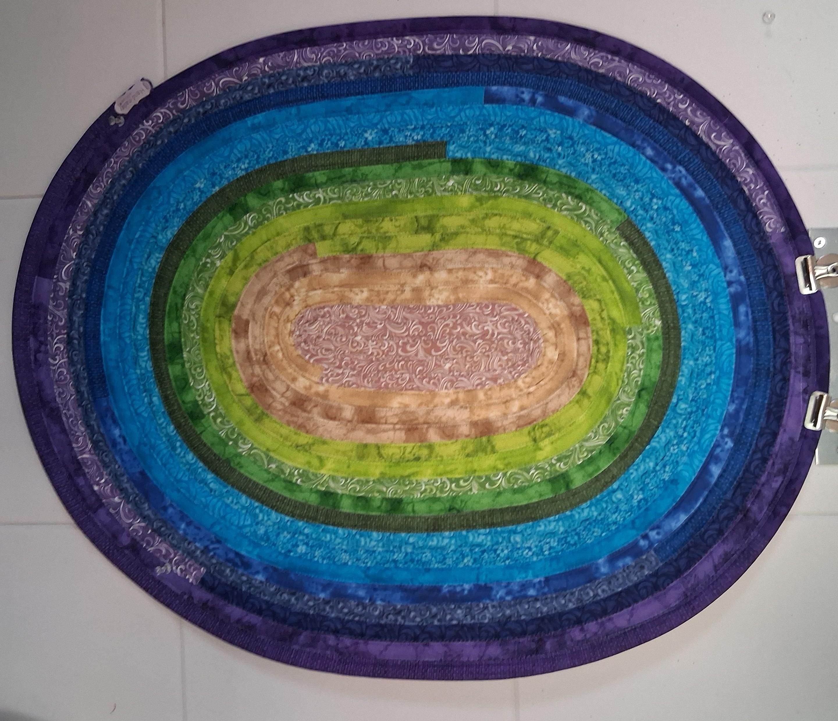 Multi-colored Handmade Oval Jelly Roll Rug